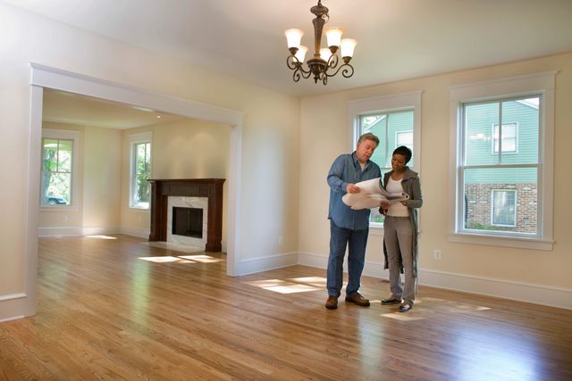 An Estate Agent Shows Around a Refurbished Period Home